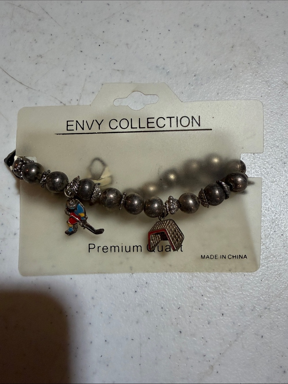 Envy Hockey themed Silver-Tone Beaded Bracelet with Colorful Enamel Charm